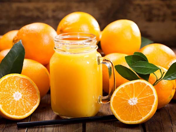 Người bị ung thư có nên uống nước cam không